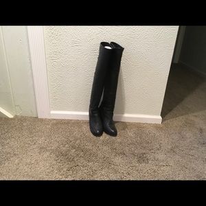 Knee high black leather boots